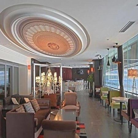 A Hotel Tianjin Bagian luar foto